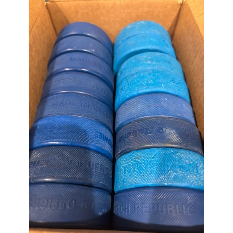 16 used blue hockey pucks (4oz)